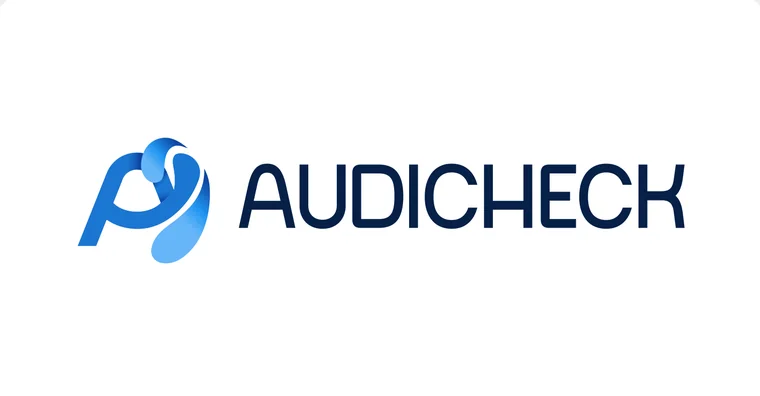 Le logo AudiCheck en couleur sur fond blanc.